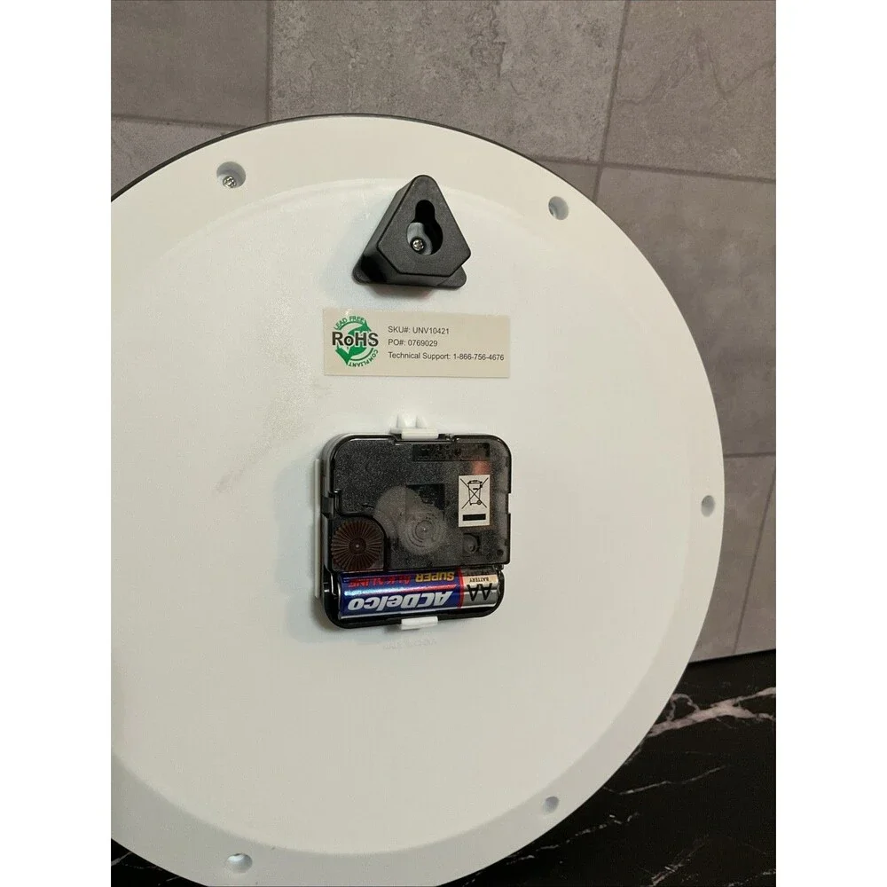 Universal Wall Clock 9 3/4 In Diameter Black Case
